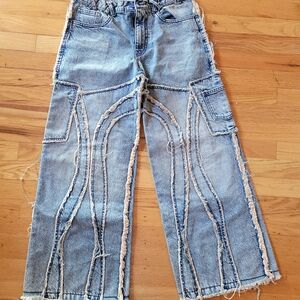 Unique Distressed Denim Jeans with Fringe